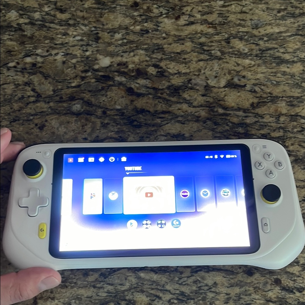 Logitech White Handheld Gaming Console with Integrated Controls